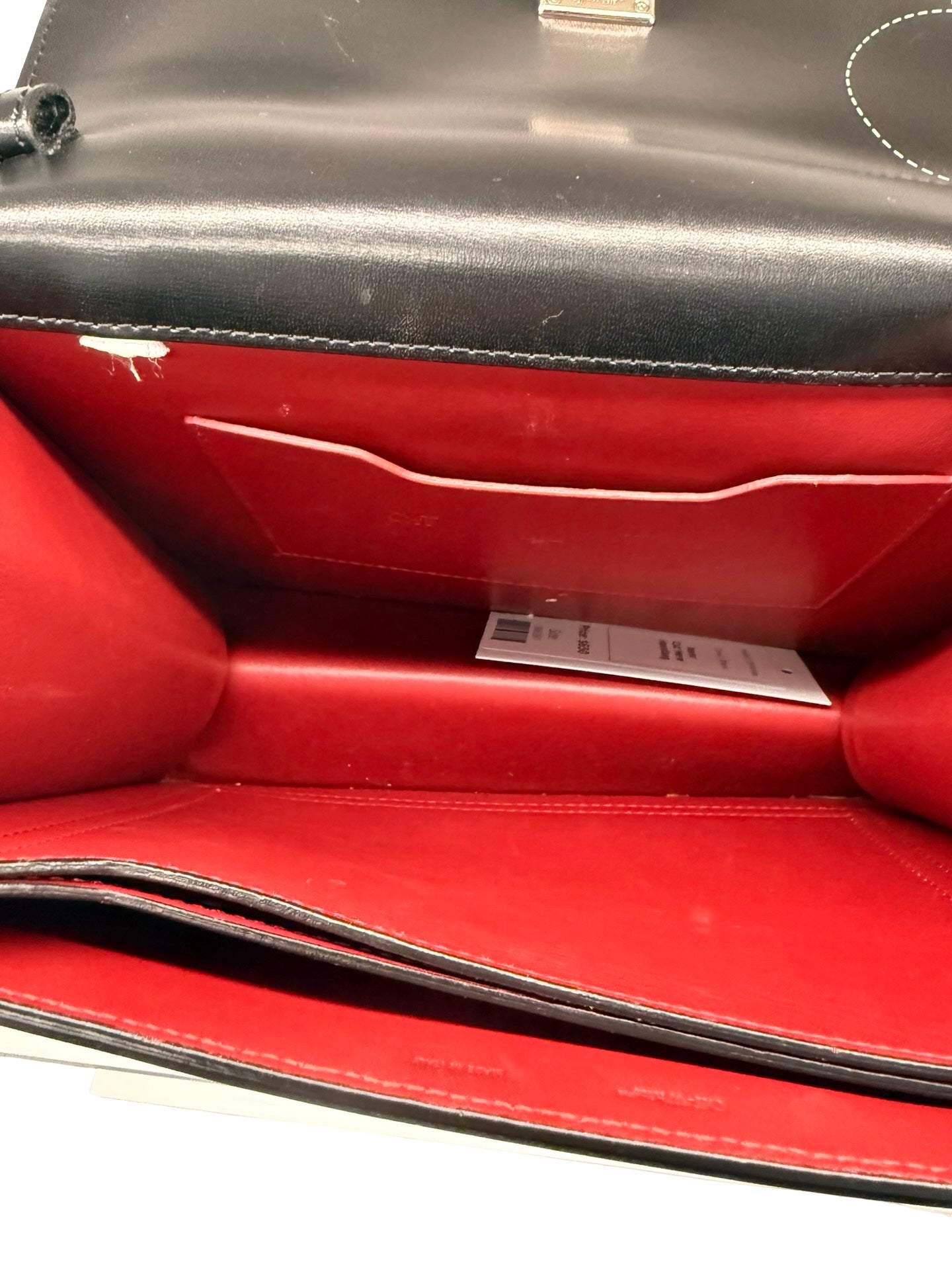 Off-White Black Leather ‘Cut Here’ Top Handle Crossbody Bag.