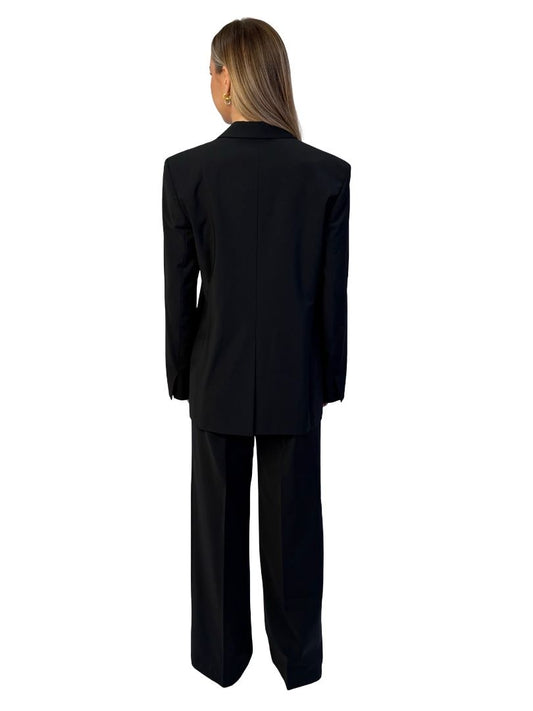 Matteau Black Relaxed Wool Suit Set. Size: 10