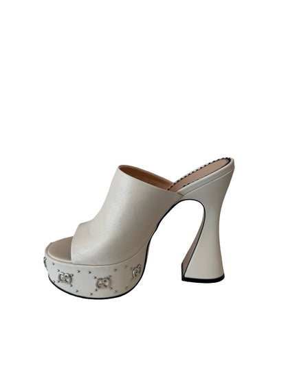Gucci Cream 'Janaya' Platform GG Mules. Size: 36