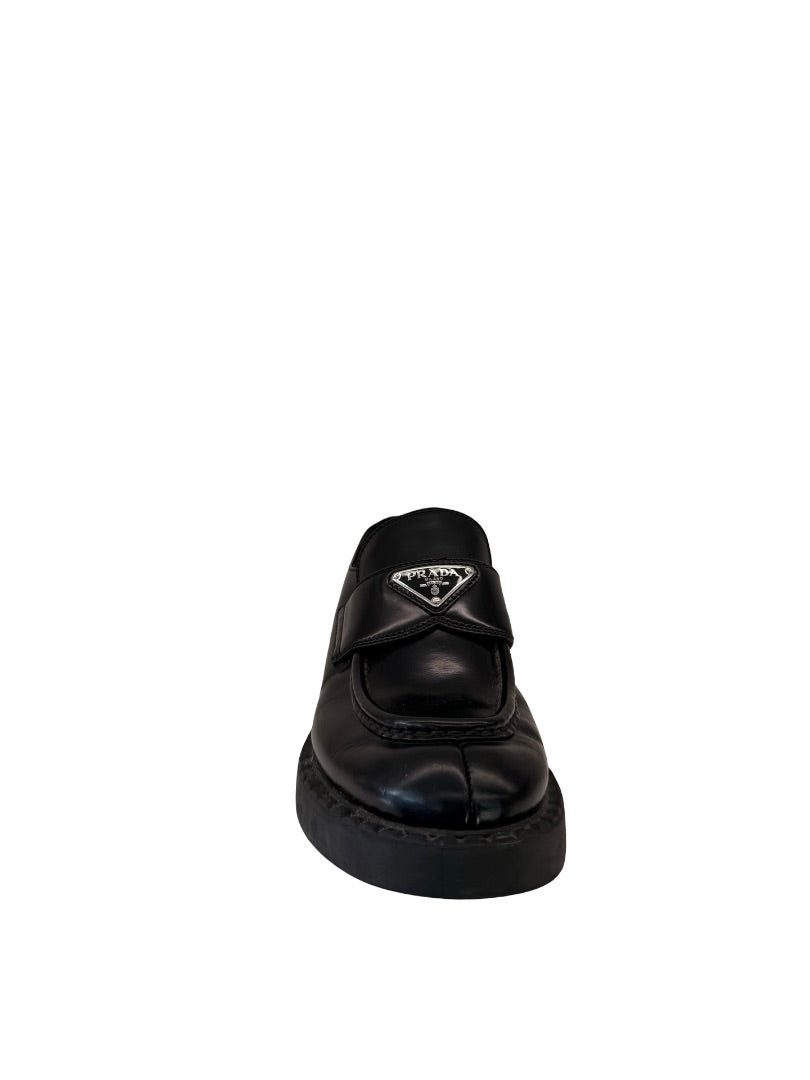 Prada Black Brushed Leather Triangle Logo Loafers. Size: 39