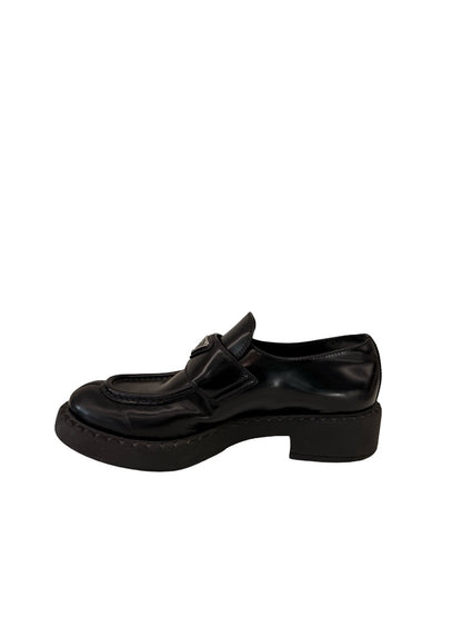 Prada Black Brushed Leather Triangle Logo Loafers. Size: 39
