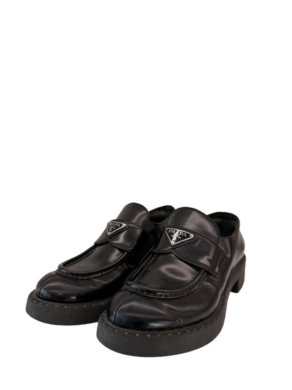 Prada Black Brushed Leather Triangle Logo Loafers. Size: 39