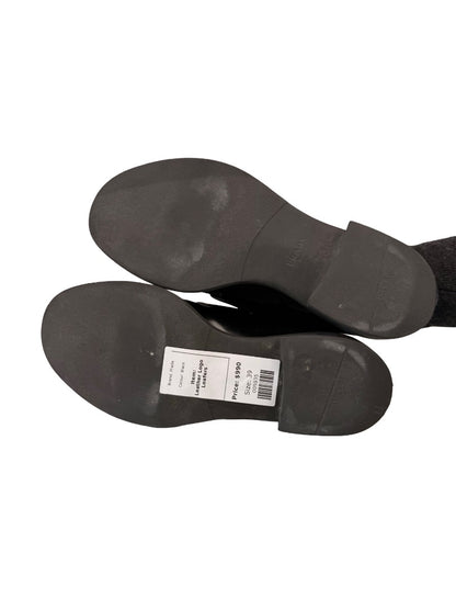 Prada Black Brushed Leather Triangle Logo Loafers. Size: 39