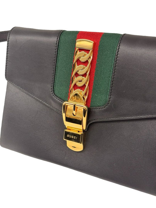 Gucci 'Sylvie' Black Leather Clutch.