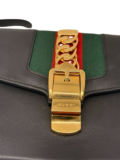 Gucci 'Sylvie' Black Leather Clutch.