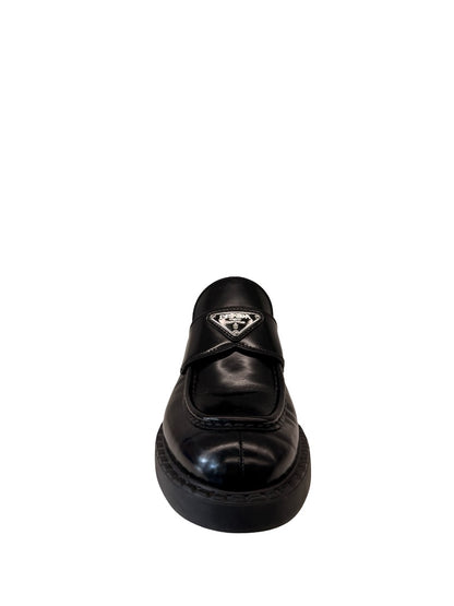 Prada Black Brushed Leather Triangle Logo Loafers. Size: 39