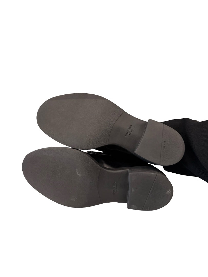 Prada Black Brushed Leather Triangle Logo Loafers. Size: 39