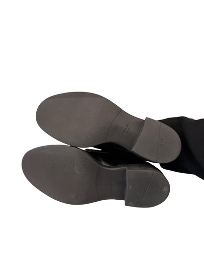 Prada Black Brushed Leather Triangle Logo Loafers. Size: 39