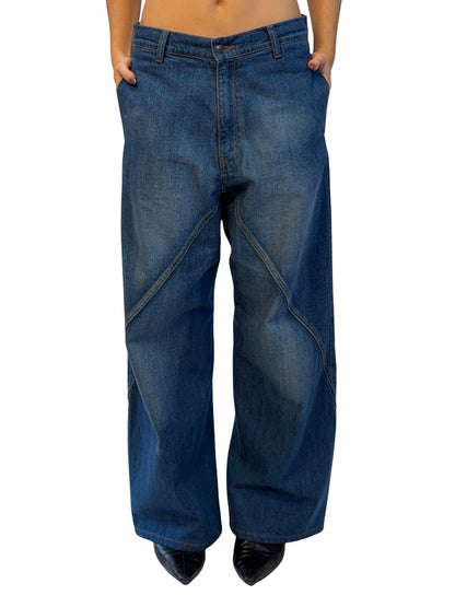 Bassike Blue Panelled Curved Leg Jean. Size: 29