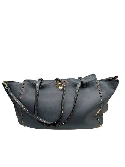 Valentino Garavani Blue Large Studded Rockstud Leather 'Trapeze' Crossbody Bag.