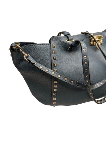Valentino Garavani Blue Large Studded Rockstud Leather 'Trapeze' Crossbody Bag.