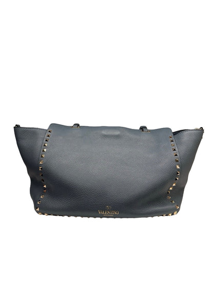 Valentino Garavani Blue Large Studded Rockstud Leather 'Trapeze' Crossbody Bag.