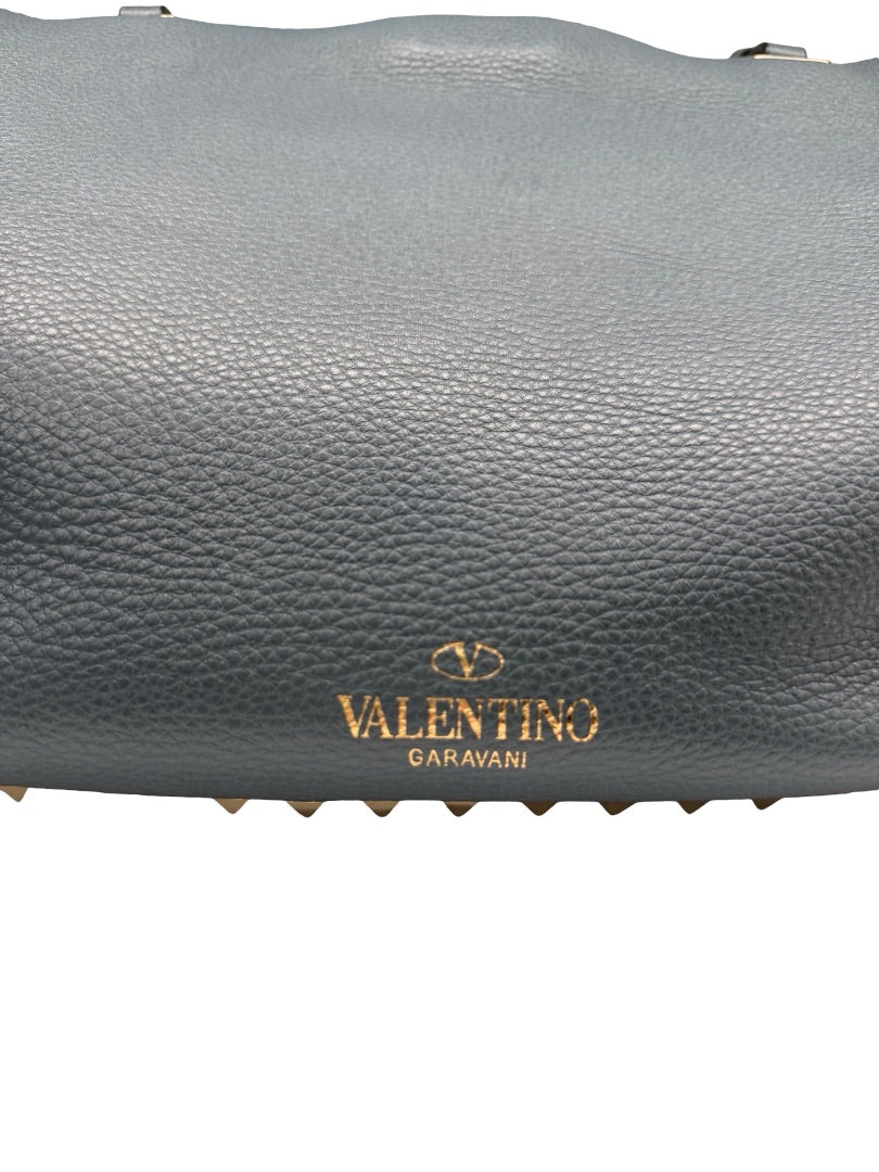 Valentino Garavani Blue Large Studded Rockstud Leather 'Trapeze' Crossbody Bag.