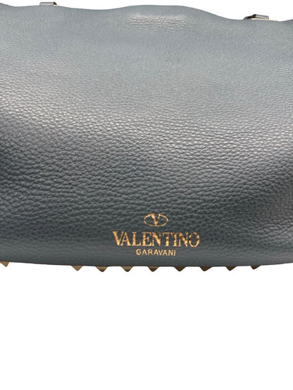 Valentino Garavani Blue Large Studded Rockstud Leather 'Trapeze' Crossbody Bag.