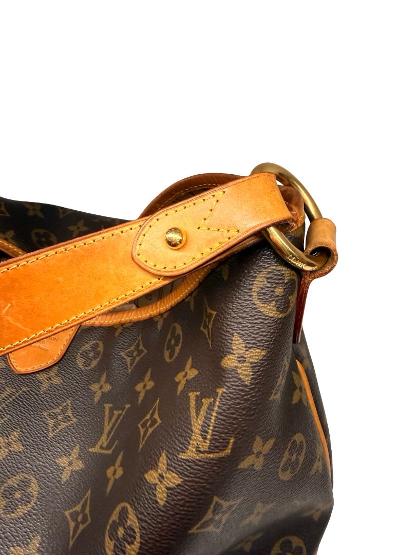 Louis Vuitton Brown 'Delightful PM' Slouchy Monogram Bag.