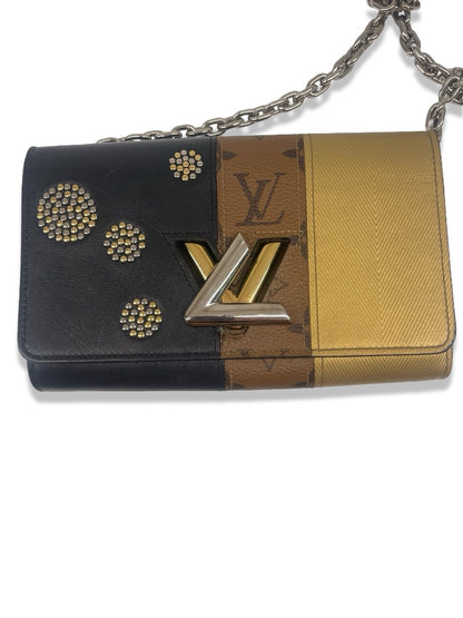 Louis Vuitton Black / Brown / Gold Louis Vuitton Reverse Monogram Studded Night Lights Twist Wallet On Chain.