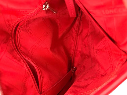 Longchamp Red Leather Satchel.
