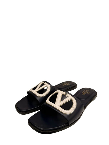 Valentino Garavani Marine Navy Flat Cut Out Logo Slides. Size: 42