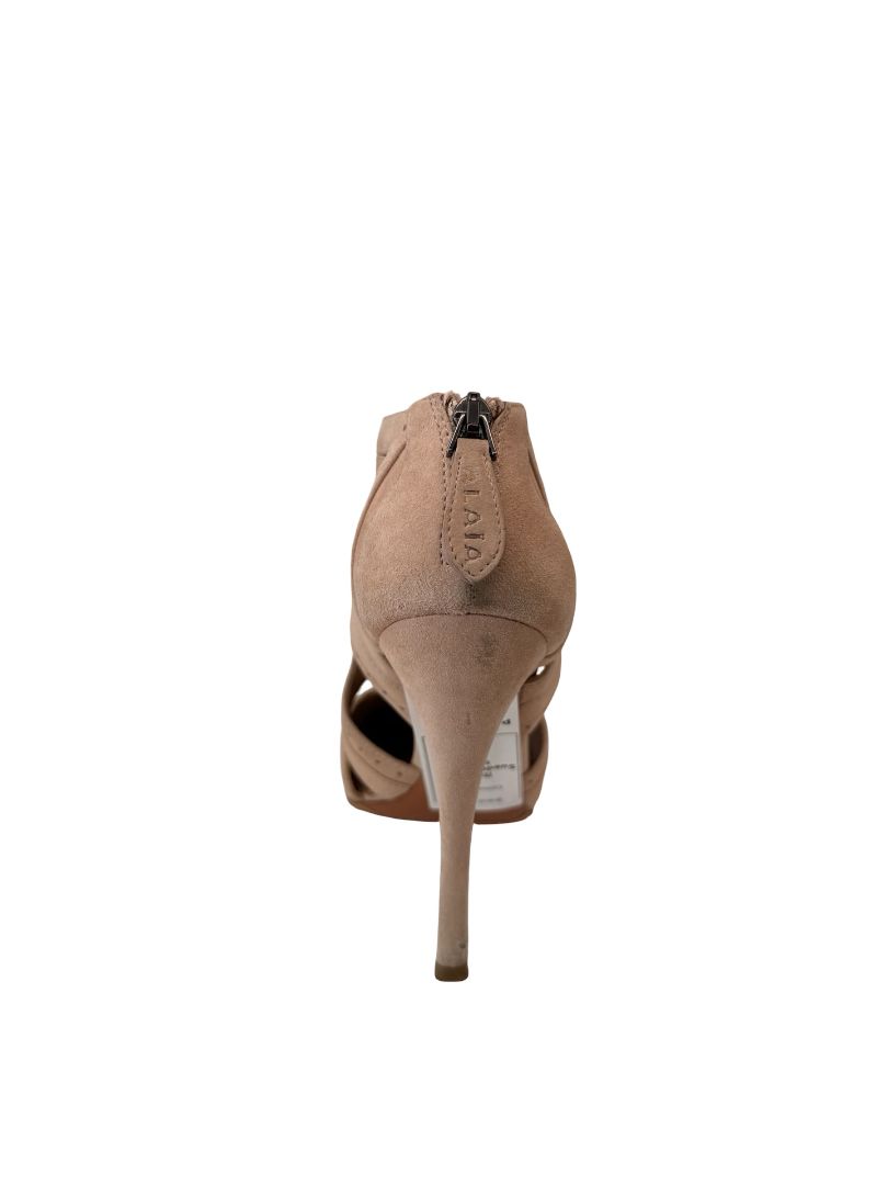 Alaia Nude Suede Circular Cutout Heels. Size: 38.5