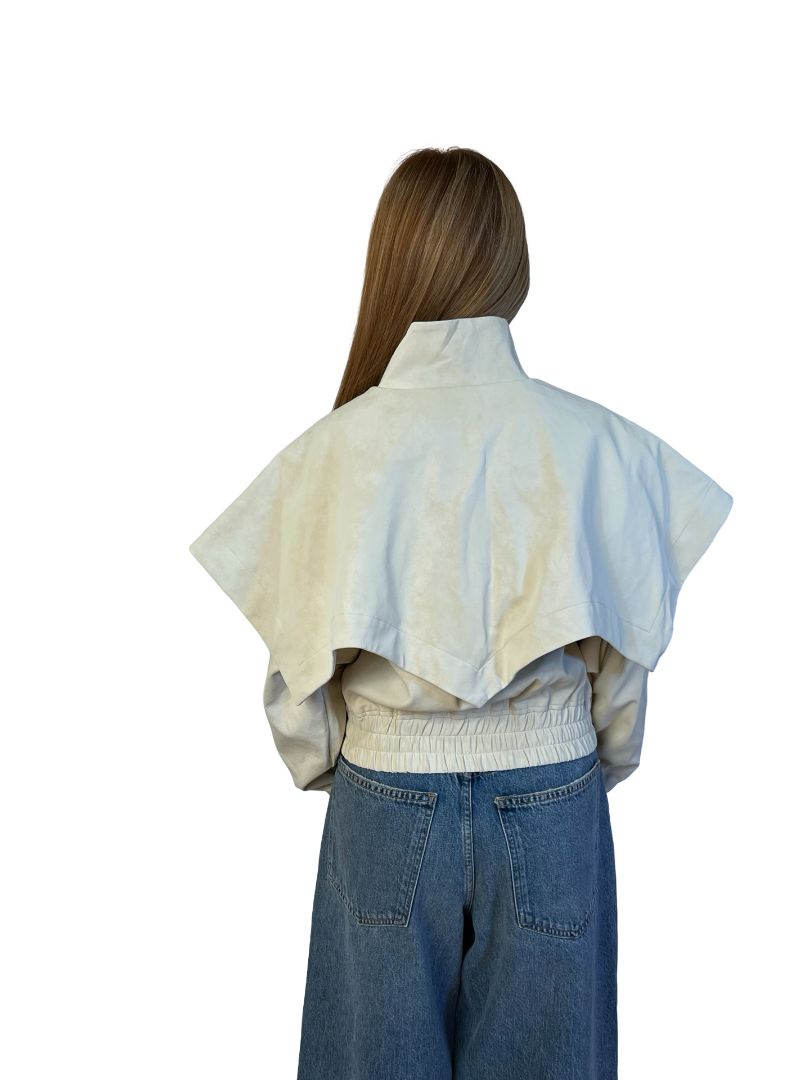 AKNVAS Cream Fake Leather Jacket w/ Cape Sleeve Overlay. Size: XS