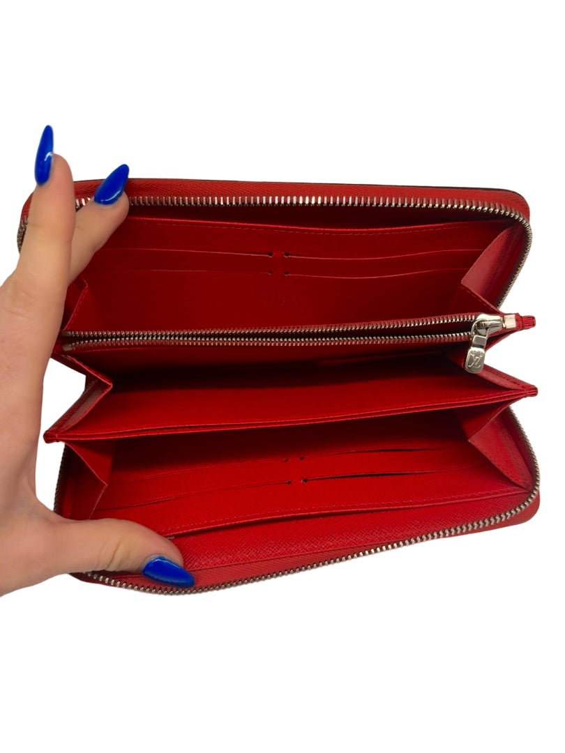 Louis Vuitton Red Patent Leather Zip Wallet.